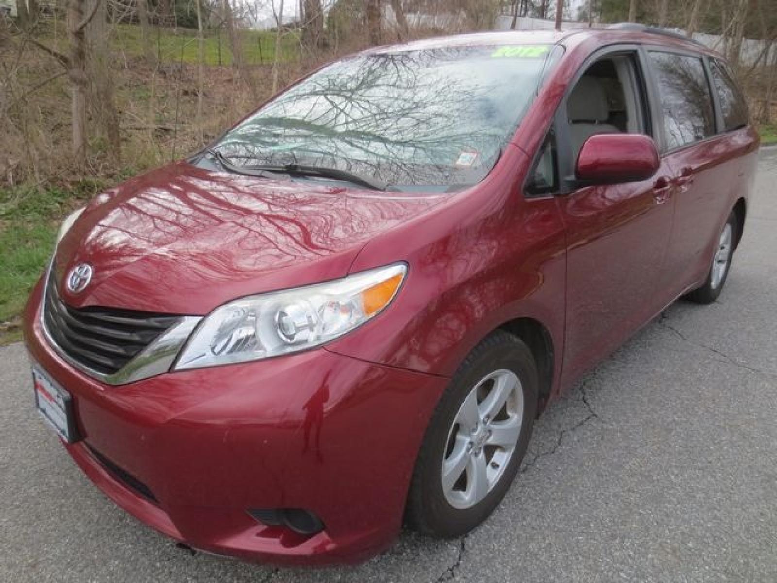 2012 Red /Gray Toyota Sienna LE (5TDKK3DC3CS) with an 3.5L v6 engine, Automatic transmission, located at 270 US Route 6, Mahopac, NY, 10541, (845) 621-0895, 41.349022, -73.755280 - Photo #0